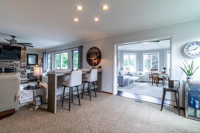 280 Ln 230 Jimmerson Lk, Angola, IN 46703 - kitchen with carpet floors, ornamental molding, recessed lighting, open floor plan, and a ceiling fan