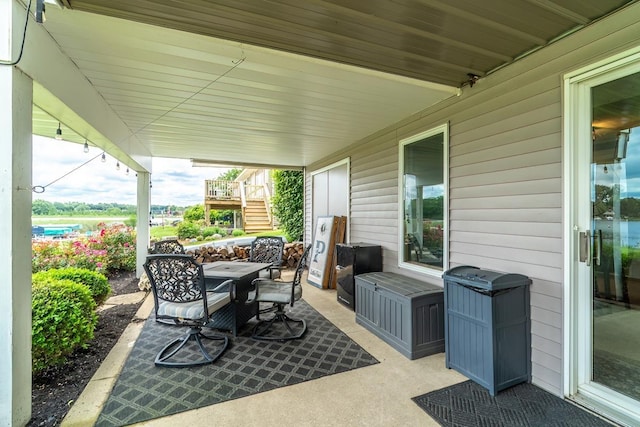 280 Ln 230 Jimmerson Lk, Angola, IN 46703 - view of patio / terrace with outdoor dining space and stairs