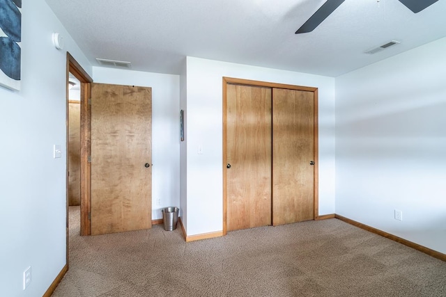 280 Ln 230 Jimmerson Lk, Angola, IN 46703 - unfurnished bedroom with carpet floors, a closet, and ceiling fan