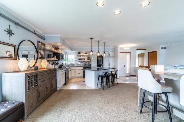 280 Ln 230 Jimmerson Lk, Angola, IN 46703 - kitchen with dark countertops, open shelves, a kitchen breakfast bar, open floor plan, and electric stove