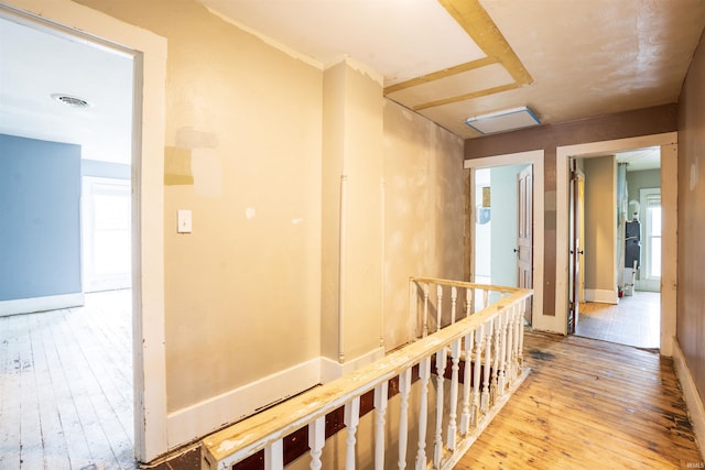 120 N Main St, Avilla, IN 46710 - hallway with an upstairs landing and light wood-type flooring