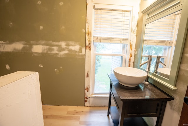 120 N Main St, Avilla, IN 46710 - bathroom with vanity and wood finished floors