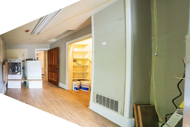120 N Main St, Avilla, IN 46710 - washroom with separate washer and dryer and wood finished floors