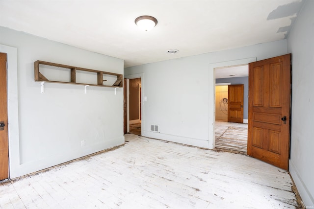 120 N Main St, Avilla, IN 46710 - unfurnished bedroom featuring a closet and light wood-type flooring