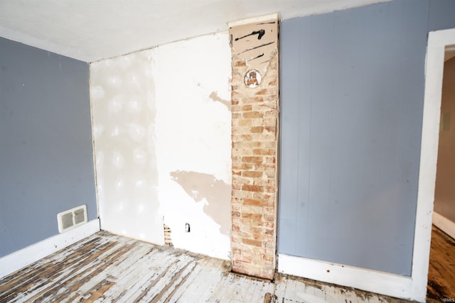 120 N Main St, Avilla, IN 46710 - empty room with wood finished floors
