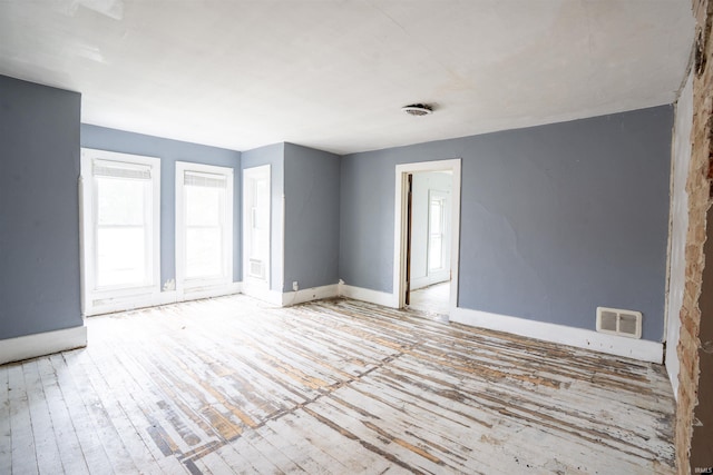 120 N Main St, Avilla, IN 46710 - spare room featuring hardwood / wood-style flooring and baseboards