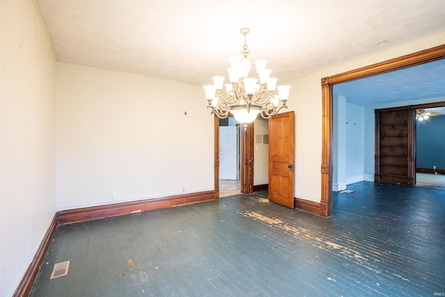 120 N Main St, Avilla, IN 46710 - unfurnished room featuring a chandelier and wood finished floors