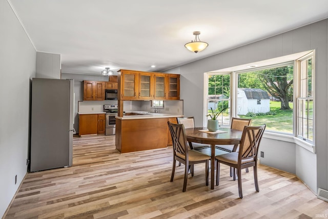 1406 W Orchard Dr, North Manchester, IN 46962 - dining room with light wood finished floors