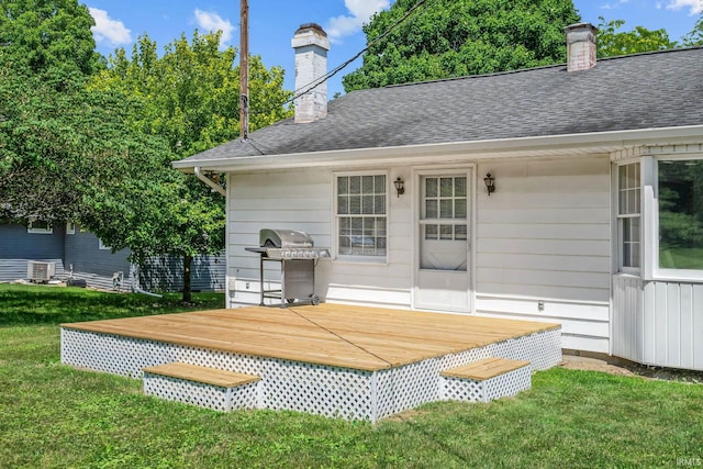 1406 W Orchard Dr, North Manchester, IN 46962 - rear view of property with a wooden deck, a yard, and a chimney