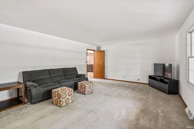 1406 W Orchard Dr, North Manchester, IN 46962 - living room featuring carpet flooring and healthy amount of natural light