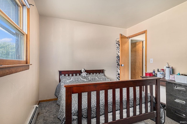 60220 Robin Hood Ln, Elkhart, IN 46517 - carpeted bedroom featuring baseboards and a baseboard heating unit