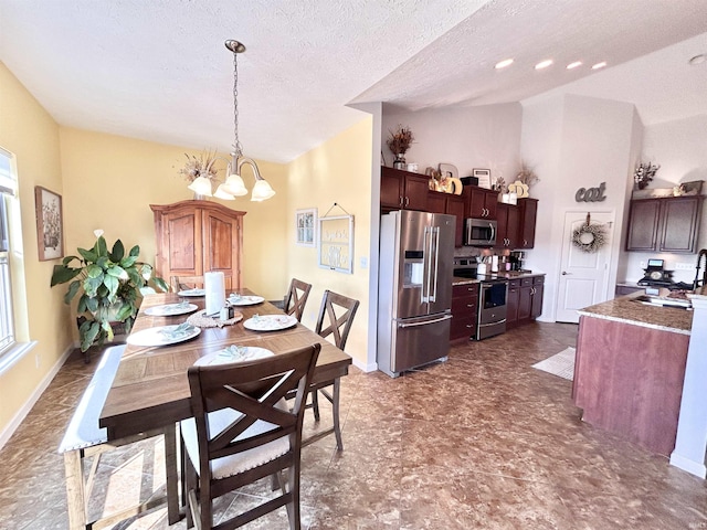 3607 Regatta Dr, Lafayette, IN 47909 - dining room with a chandelier and a textured ceiling