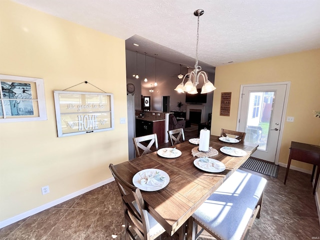 3607 Regatta Dr, Lafayette, IN 47909 - dining area with a chandelier and a textured ceiling