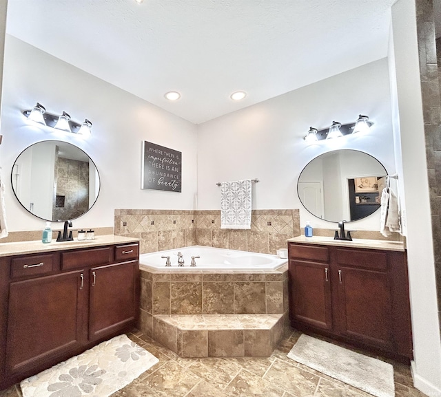 3607 Regatta Dr, Lafayette, IN 47909 - bathroom with a bath and two vanities
