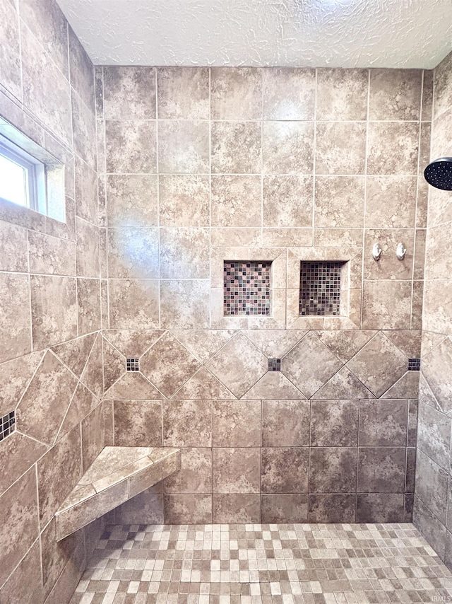 3607 Regatta Dr, Lafayette, IN 47909 - full bathroom with a tile shower and a textured ceiling