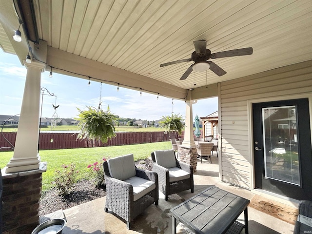 3607 Regatta Dr, Lafayette, IN 47909 - fenced backyard with a patio, an outdoor hangout area, and ceiling fan