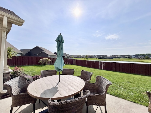 3607 Regatta Dr, Lafayette, IN 47909 - fenced backyard with outdoor dining space, a residential view, and a patio