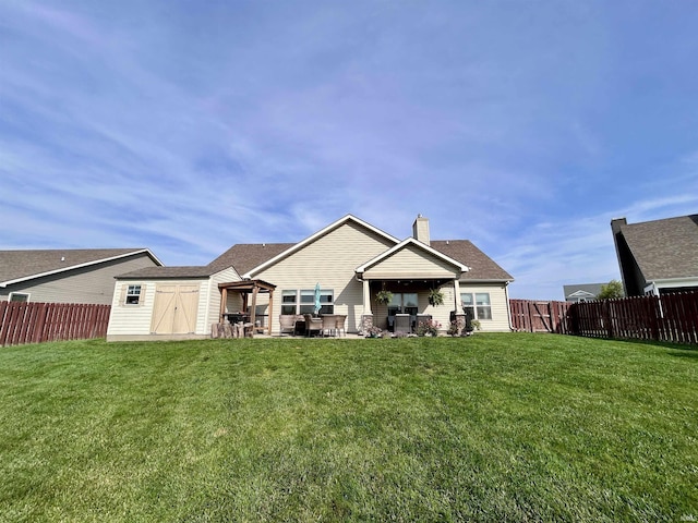 3607 Regatta Dr, Lafayette, IN 47909 - back of property with a shed, a patio area, a fenced backyard, and a chimney