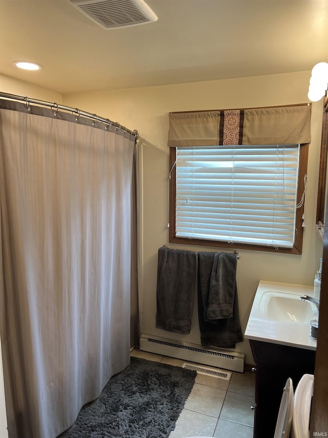 406 Twillo Run Dr, New Haven, IN 46774 - bathroom with tile patterned floors, vanity, a baseboard radiator, and a shower with curtain