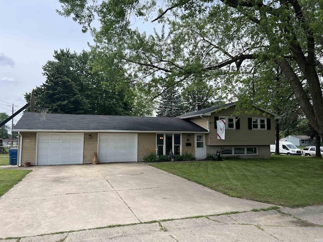 406 Twillo Run Dr, New Haven, IN 46774 - tri-level home with driveway, a garage, and a front yard