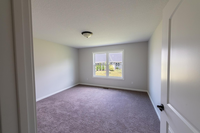 5205 Pigeon Creek Ct, Fort Wayne, IN 46825 - carpeted empty room featuring a textured ceiling