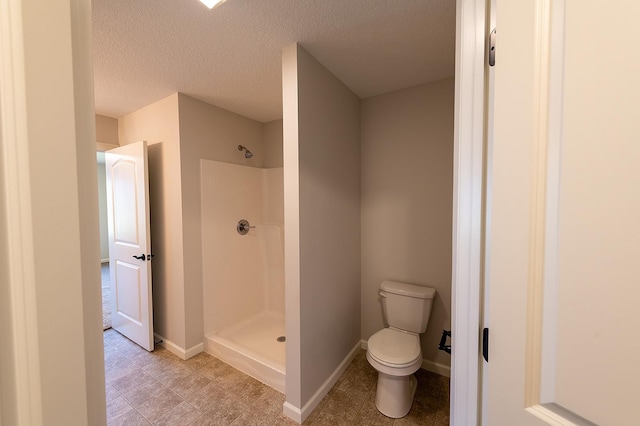5205 Pigeon Creek Ct, Fort Wayne, IN 46825 - full bathroom featuring a shower and a textured ceiling