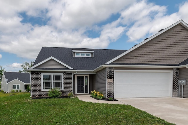 5205 Pigeon Creek Ct, Fort Wayne, IN 46825 - view of front of property with brick siding, concrete driveway, a front yard, and a garage