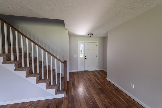 5205 Pigeon Creek Ct, Fort Wayne, IN 46825 - entryway featuring wood finished floors, stairs, and a textured ceiling