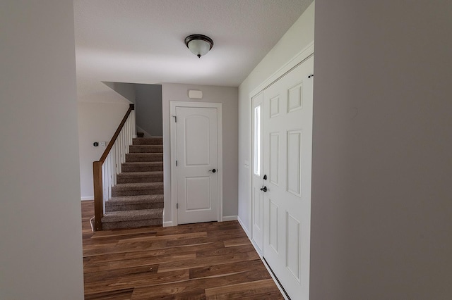 5205 Pigeon Creek Ct, Fort Wayne, IN 46825 - entryway with stairway and dark wood finished floors