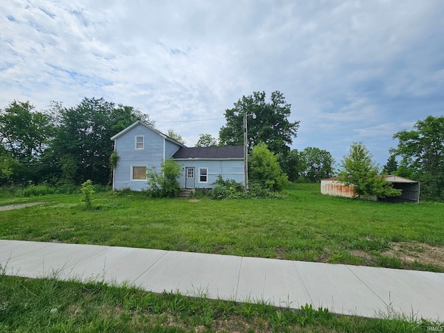 407 N Ray St, Fremont, IN 46737 - view of side of property featuring a yard