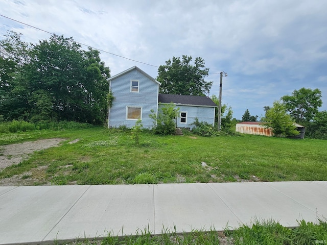 407 N Ray St, Fremont, IN 46737 - view of side of property featuring a lawn