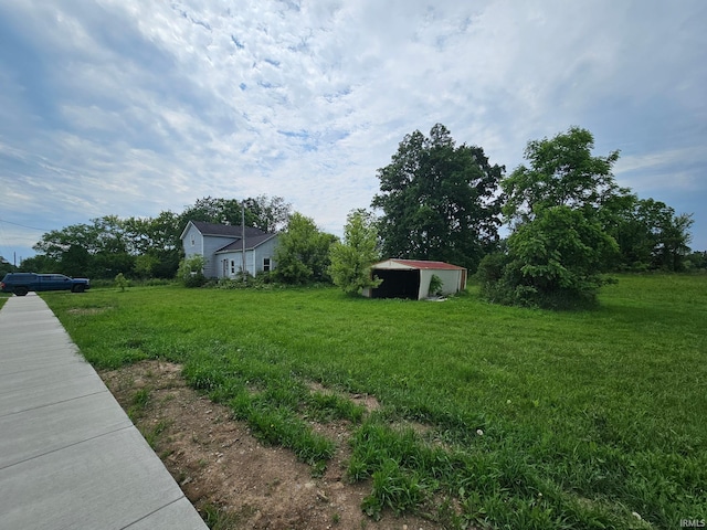 407 N Ray St, Fremont, IN 46737 - view of green lawn with an outbuilding