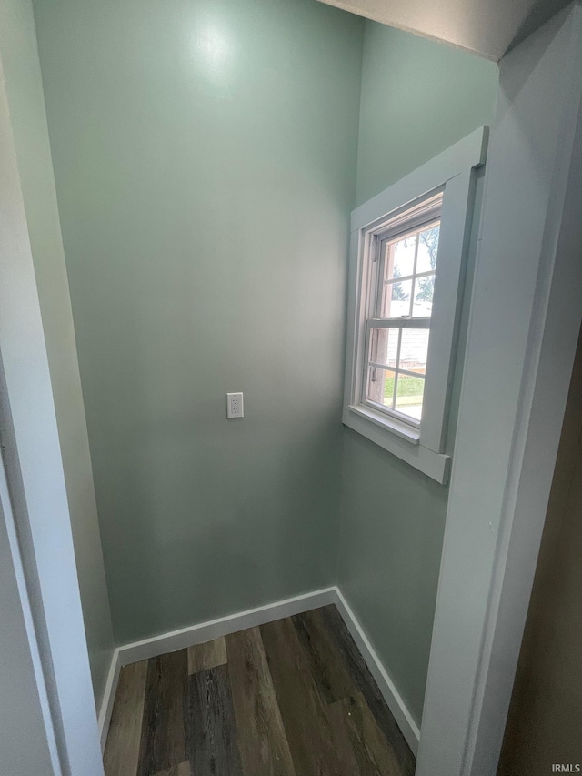 312 E 2nd St, Bicknell, IN 47512 - empty room featuring baseboards and dark wood-type flooring