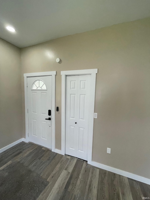 312 E 2nd St, Bicknell, IN 47512 - foyer entrance featuring baseboards and wood finished floors