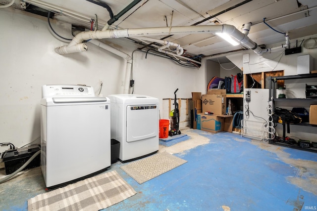 51881 Currant Rd, Granger, IN 46530 - unfinished basement featuring washing machine and dryer