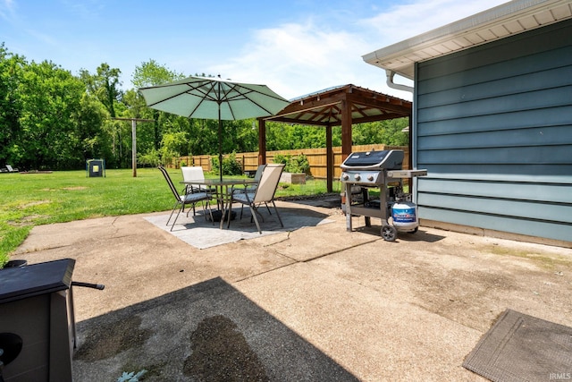 51881 Currant Rd, Granger, IN 46530 - view of patio featuring area for grilling, outdoor dining area, and a gazebo