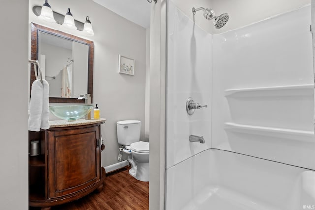 51881 Currant Rd, Granger, IN 46530 - bathroom with wood finished floors, curtained shower, and vanity