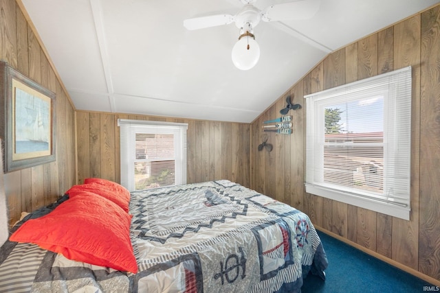 387 Ems T26 Ln, Leesburg, IN 46538 - carpeted bedroom with lofted ceiling, wood walls, and ceiling fan