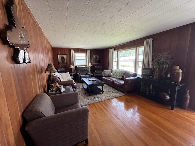 305 S Grove St, Odon, IN 47562 - living room featuring wood finished floors and wood walls