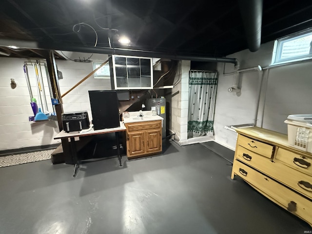 305 S Grove St, Odon, IN 47562 - basement featuring electric water heater and concrete block wall