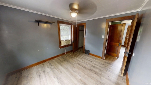 1219 Oakland St, Fort Wayne, IN 46808 - unfurnished bedroom with ornamental molding, light wood-type flooring, cooling unit, and ceiling fan