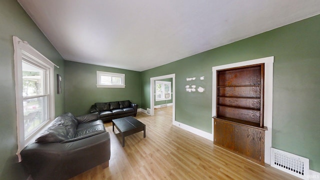 1219 Oakland St, Fort Wayne, IN 46808 - living room featuring light wood-style flooring and baseboards