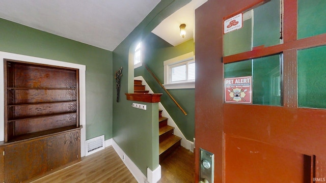 1219 Oakland St, Fort Wayne, IN 46808 - stairway featuring wood finished floors