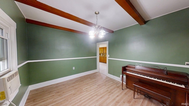 1219 Oakland St, Fort Wayne, IN 46808 - sitting room featuring a chandelier and wood finished floors