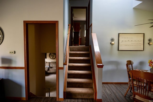 27222 Country Lake Ln, Elkhart, IN 46514 - stairway with wood finished floors and a ceiling fan