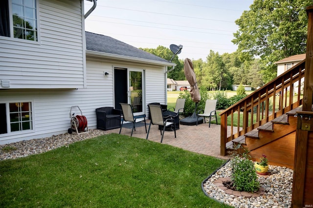 27222 Country Lake Ln, Elkhart, IN 46514 - view of green lawn featuring a patio and stairway