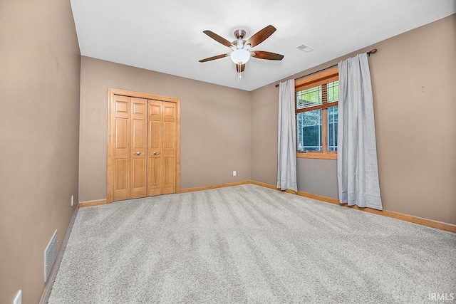 55623 Little Creek Ln, Middlebury, IN 46540 - unfurnished bedroom with a closet, carpet flooring, and ceiling fan