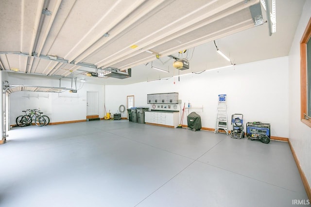 55623 Little Creek Ln, Middlebury, IN 46540 - garage featuring a garage door opener