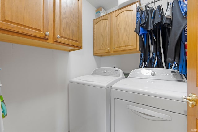 1108 Willen Ln, Fort Wayne, IN 46818 - laundry area with independent washer and dryer and cabinet space