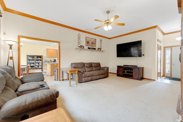 1108 Willen Ln, Fort Wayne, IN 46818 - living room with light colored carpet, ceiling fan, healthy amount of natural light, and crown molding